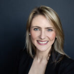 Personal Branding image showing a smiling woman headshots by Joanna Zydel Photography