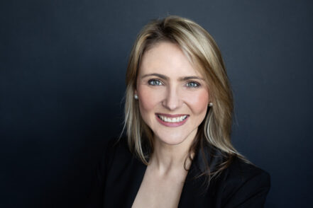 Personal Branding image showing a smiling woman headshots by Joanna Zydel Photography