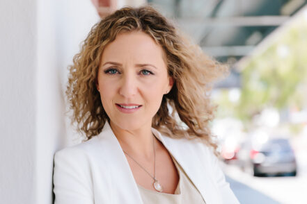 Personal Branding Headshots of 40 year old woman in white jacket by Joanna Zydel Bunbury Photographer